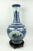 BOTTLE VASE, Chinese blue and white, with ornate scrolling foliate decoration and cartouches with