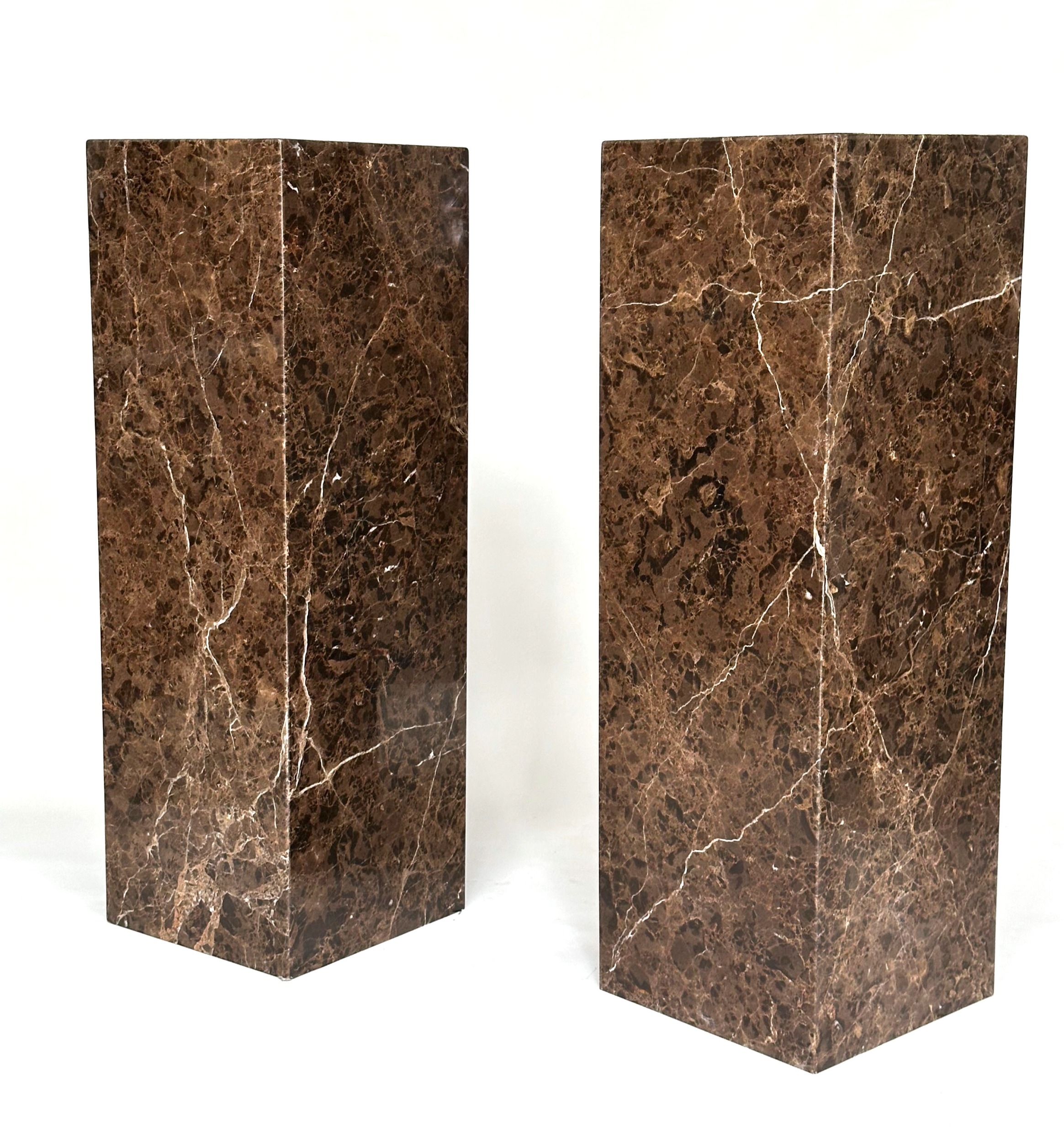 COLUMNS, a pair, variegated brown marble, 40cm x 40cm x 120cm H. (2)