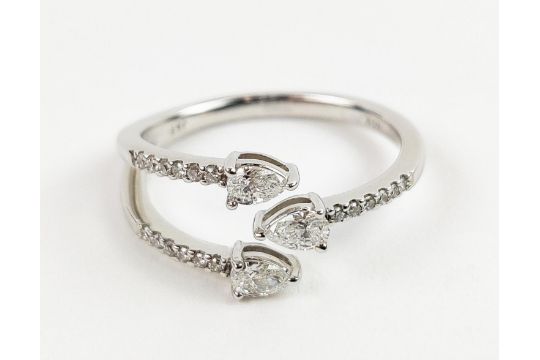 A 9CT WHITE GOLD DIAMOND RING, with three main pear shaped diamonds, diamond set shoulders, total - Image 6 of 9