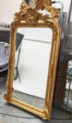 OVERMANTEL WALL MIRROR, ornate gilt frame with bevelled plate, 159cm H x 85cm W.