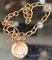 9 CARAT GOLD POCKET WATCH CHAIN WITH 9 CARAT GOLD PENDANT - APPROXIMATE WEIGHT = 49.2 GRAMS