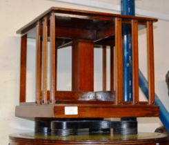 MINIATURE MAHOGANY REVOLVING BOOKCASE