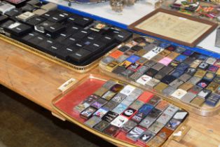 A LARGE COLLECTION OF VARIOUS ZIPPO LIGHTERS WITH VARIOUS BOXES