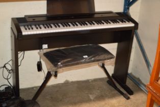 ROLAND ELECTRIC PIANO WITH STOOL