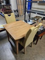 MODERN PULL OUT DINING TABLE WITH PAIR OF LEATHER MATCHING CHAIRS