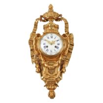 FRENCH LOUIS XVI STYLE GILT BRONZE AND BRASS CARTEL CLOCK