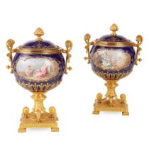 PAIR OF FRENCH SEVRES STYLE PORCELAIN AND GILT BRONZE URNS AND COVERS