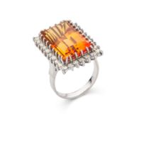 A citrine and diamond cocktail ring