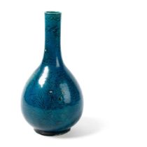 TURQUOISE-GLAZED 'LION-DOGS' BOTTLE VASE