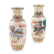 [PRIVATE SCOTTISH COLLECTION, GLASGOW] PAIR OF CRACKLE-GROUND FAMILLE ROSE 'DOG OF FOO' VASES