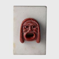 ROMAN RED JASPER APPLIQUE IN THE FORM OF AN ACTOR'S MASK