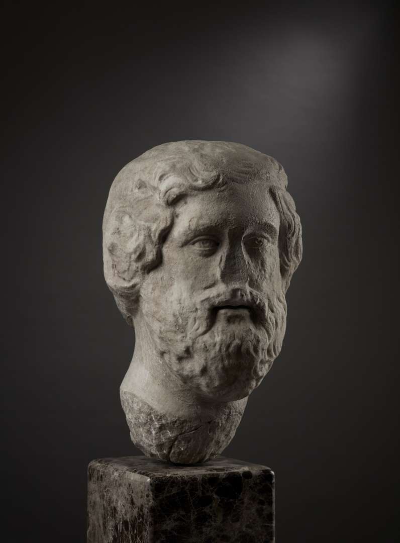 ROMAN OVER-LIFE-SIZE MARBLE HEAD OF ZEUS-AMON