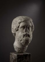 ROMAN OVER-LIFE-SIZE MARBLE HEAD OF ZEUS-AMON