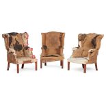 THREE GEORGE III WING ARMCHAIRS