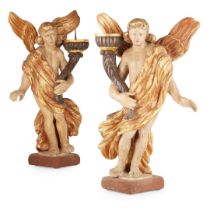 PAIR OF CONTINENTAL CARVED, POLYCHROMED, AND PARCEL-GILT FIGURAL PRICKET STICKS