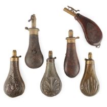 GROUP OF FIVE POWDER HORNS AND A SHOT FLASK