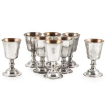 SET OF EIGHT LARGE SILVER-PLATED ECCLESIASTICAL COMMUNION CHALICES