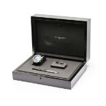 Chaumet. A titanium & steel automatic chronograph wristwatch, diamond-set cufflinks and a pen