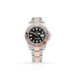 Rolex. A fine stainless steel and pink gold automatic dual-time wristwatch