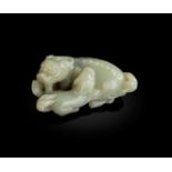 CELADON JADE CARVING OF A LION AND CUB