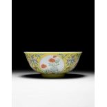 FINE YELLOW-GROUND FAMILLE ROSE SGRAFFITO 'MEDALLION' BOWL