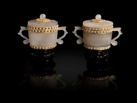 PAIR OF TWO-HANDLED FLUTED AGATE CUPS AND COVERS