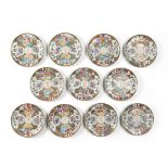 SET OF ELEVEN CANTON FAMILLE ROSE 'ARMORIAL' DISHES