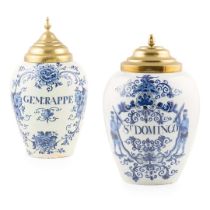 TWO DUTCH DELFT TOBACCO JARS WITH COVERS