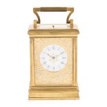 ENGLISH GILT BRASS REPEATING CARRIAGE CLOCK