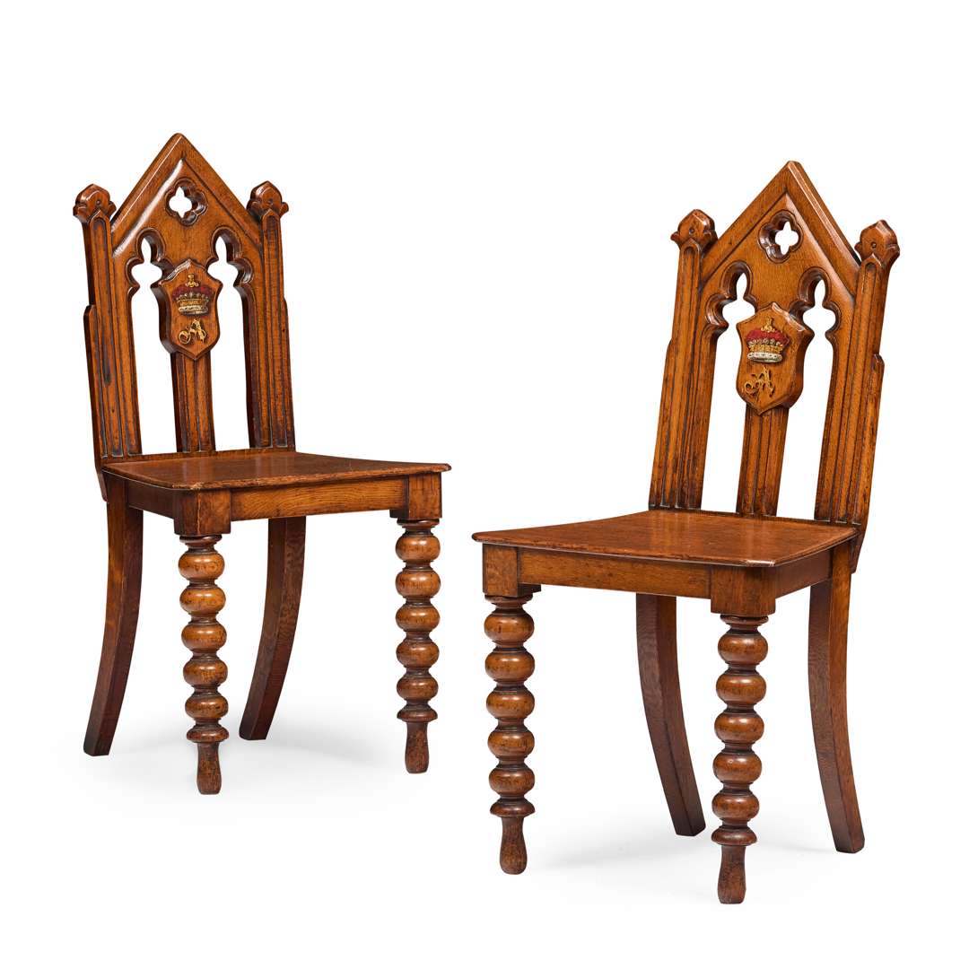 PAIR OF SCOTTISH GOTHIC REVIVAL ARMORIAL HALL CHAIRS