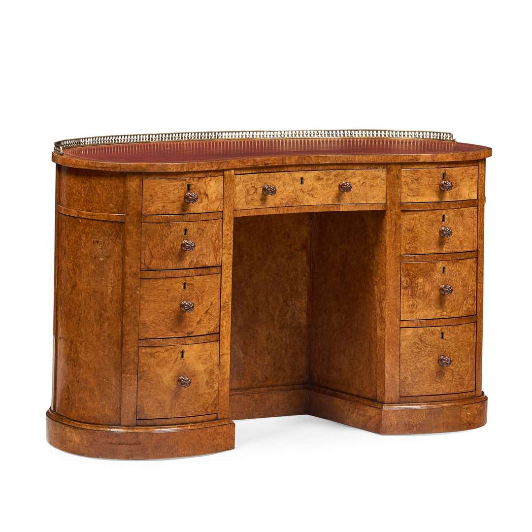 VICTORIAN BURR AND POLLARD OAK KIDNEY-SHAPED KNEEHOLE DESK, IN THE MANNER OF GILLOWS