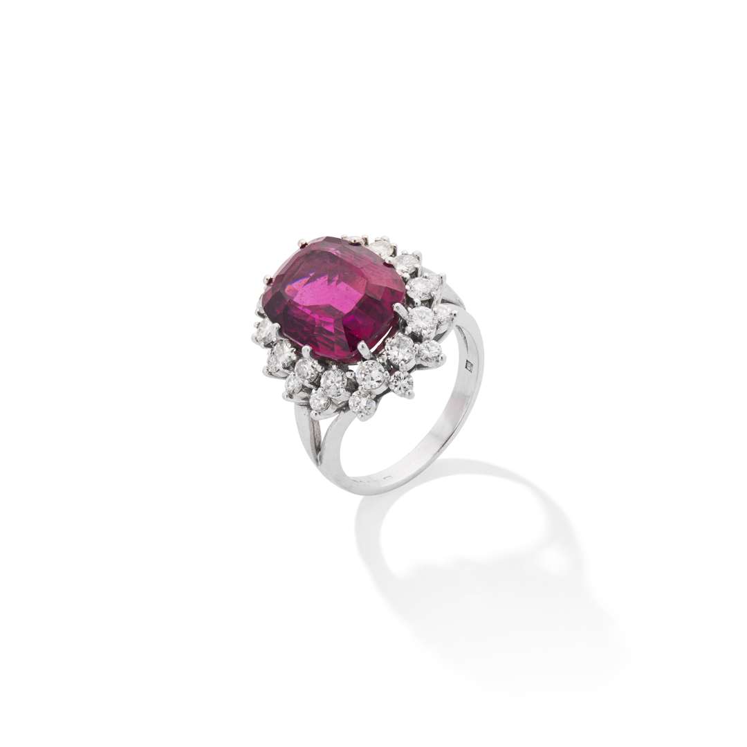 An 18ct gold rubellite and diamond cluster ring