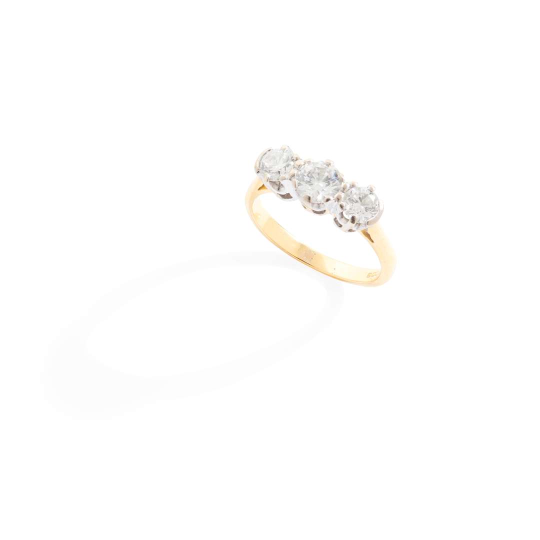 An 18ct gold diamond three-stone ring