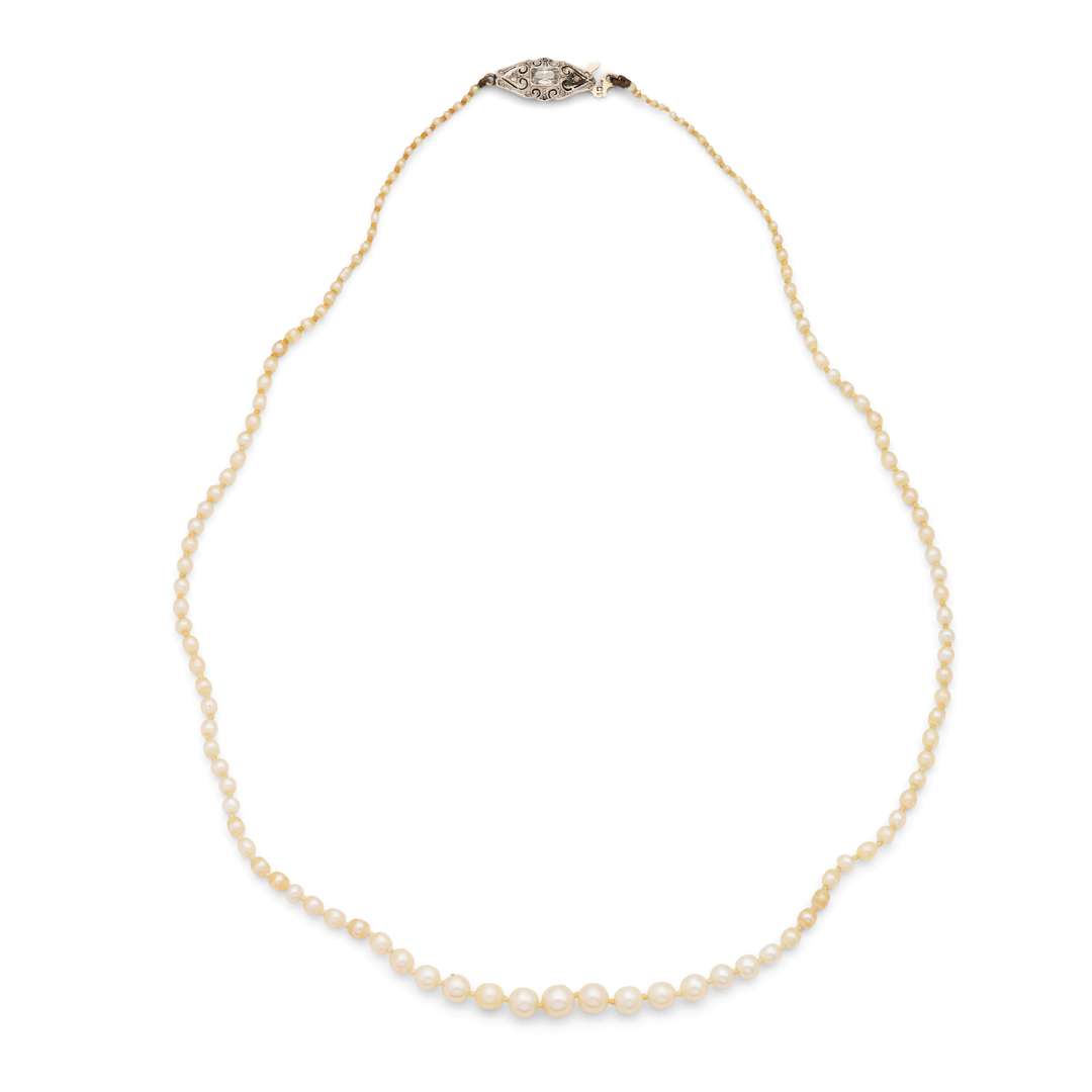 A pearl and diamond necklace