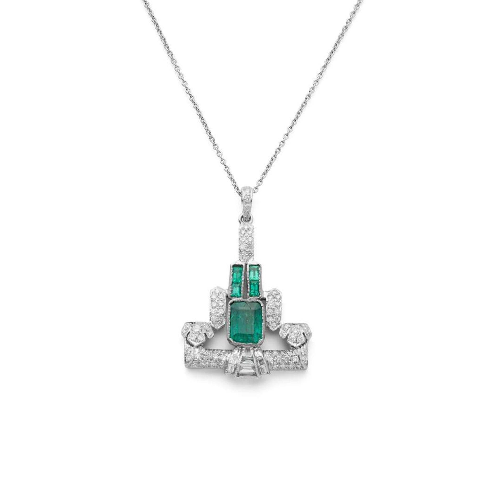 An emerald and diamond pendant