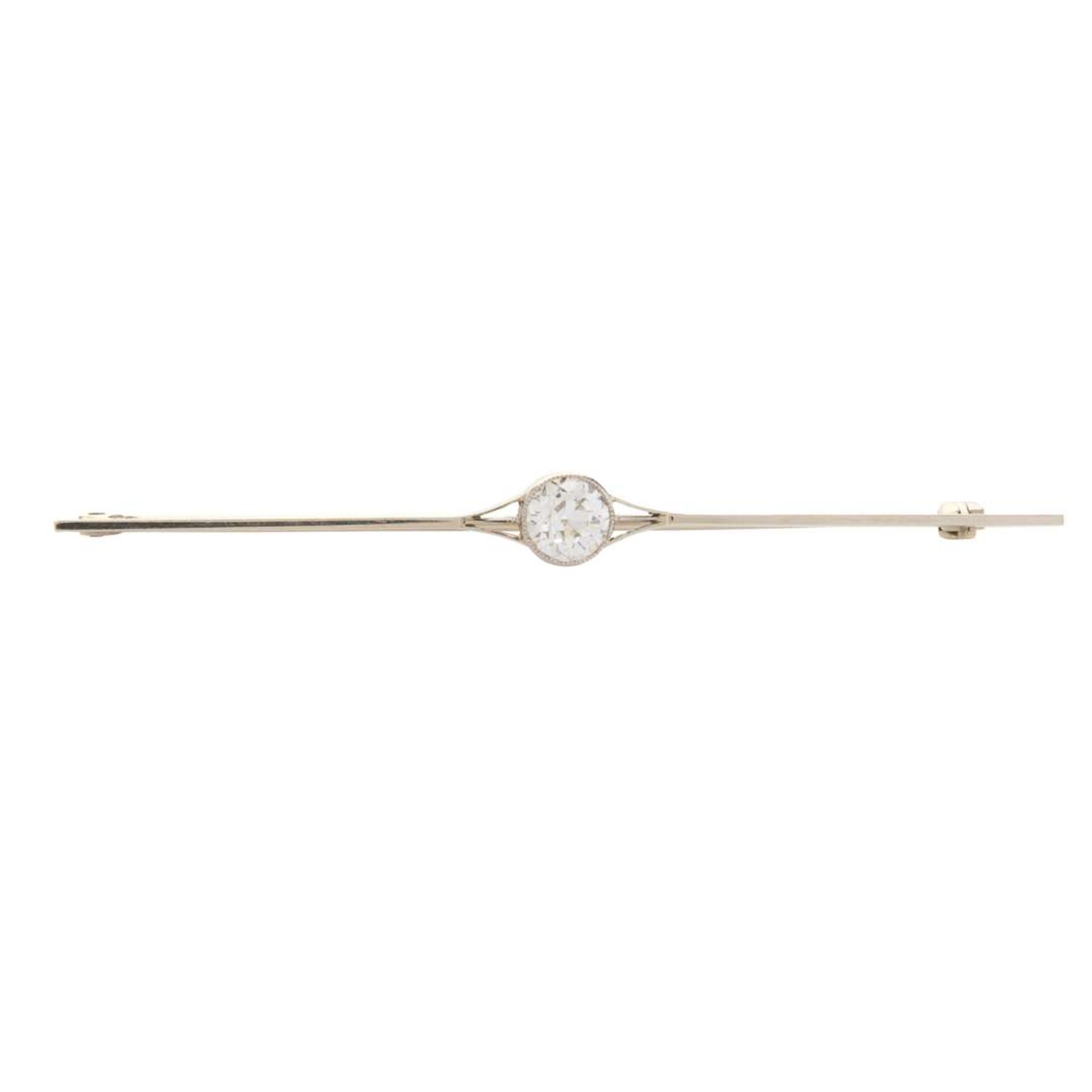 A diamond single-stone bar brooch