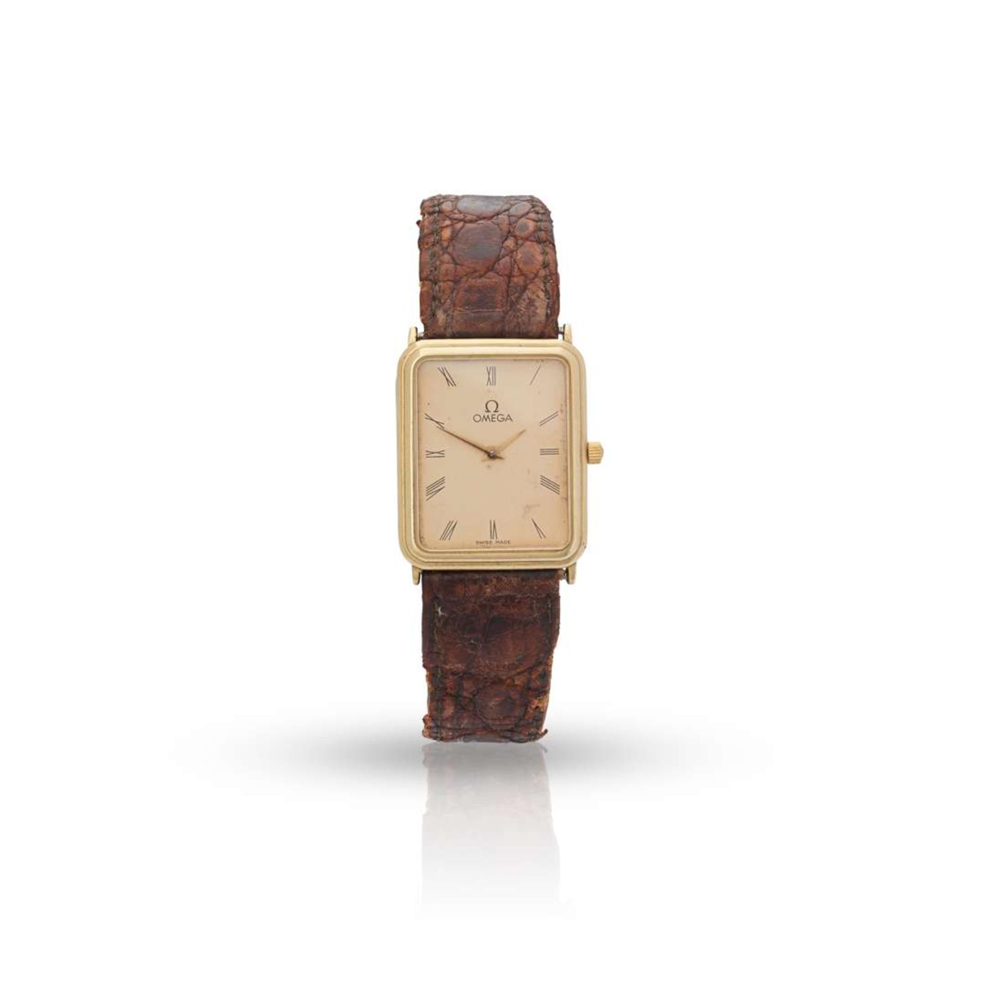 Omega. A gentleman's 9k gold rectangular quartz wristwatch