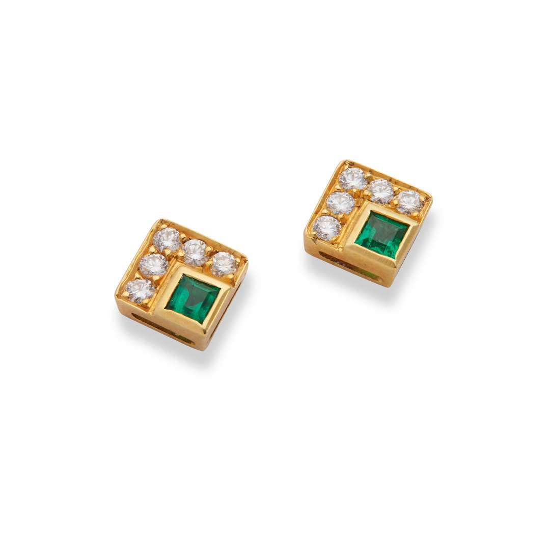 A pair of emerald and diamond stud earrings