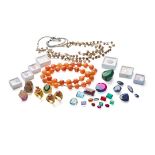 A large collection of unmounted gemstones and jewellery