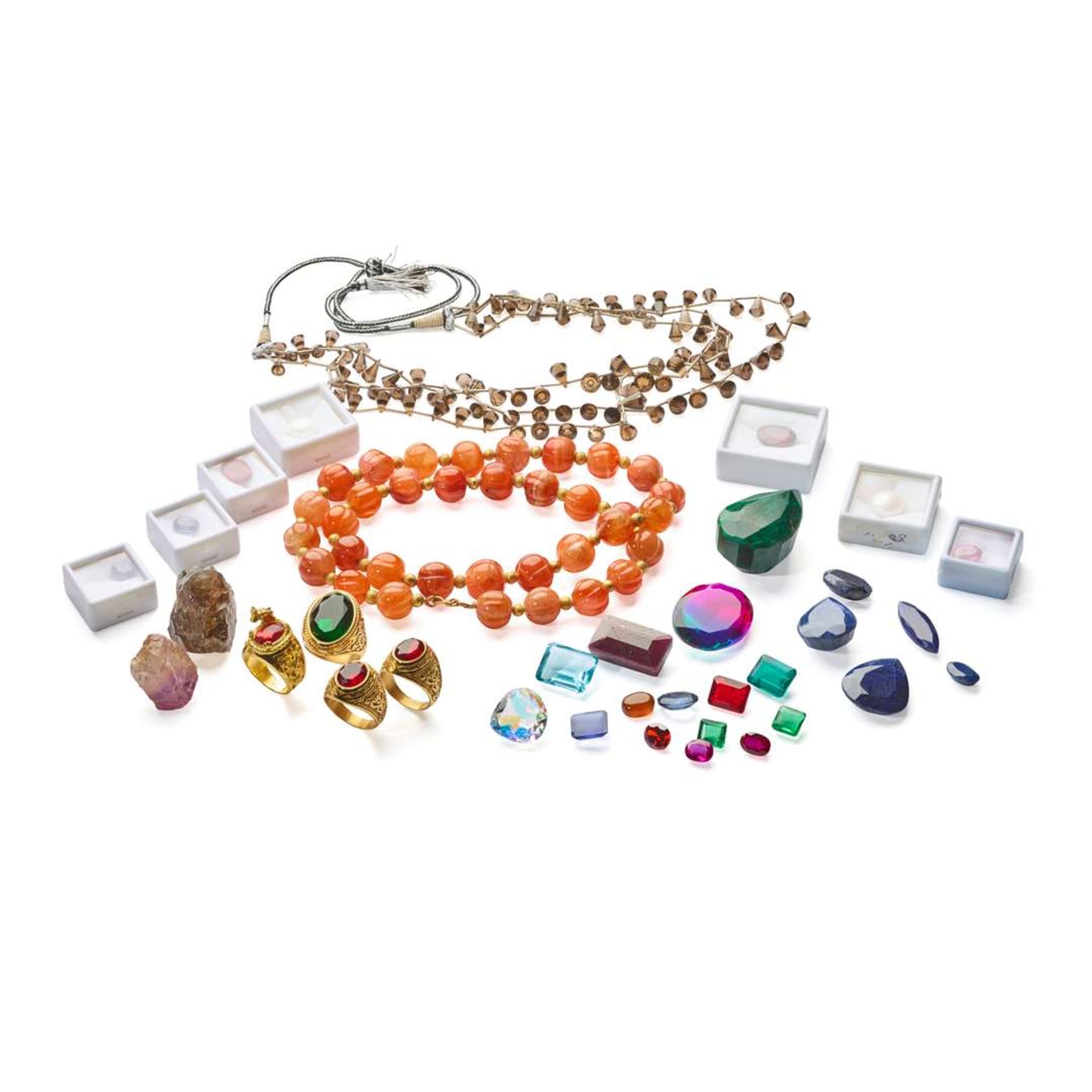 A large collection of unmounted gemstones and jewellery