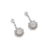 A pair of diamond pendent earrings