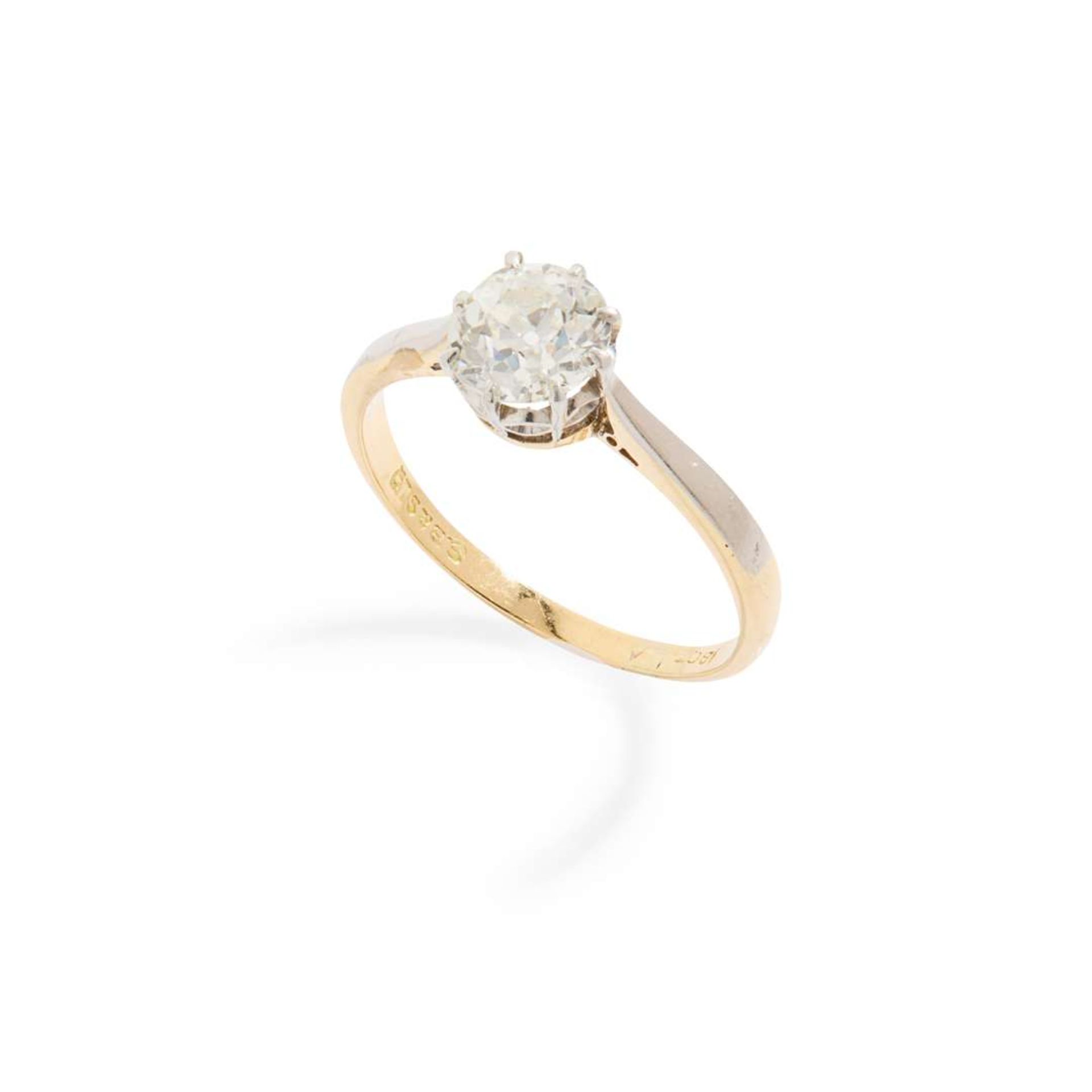 A diamond single-stone ring in yellow gold