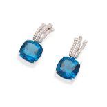 A pair of blue topaz and diamond earrings