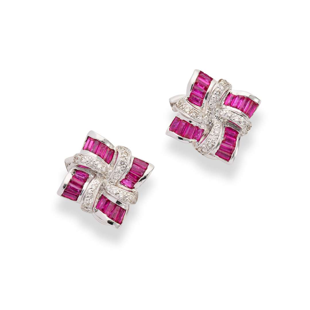 A pair of ruby and diamond earrings