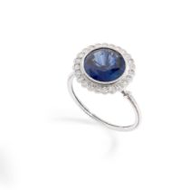 An early 20th century sapphire and diamond cluster ring, circa 1915