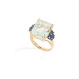 An aquamarine and sapphire cocktail ring