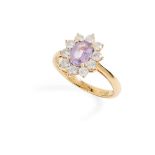 An 18ct gold coloured sapphire and diamond cluster ring