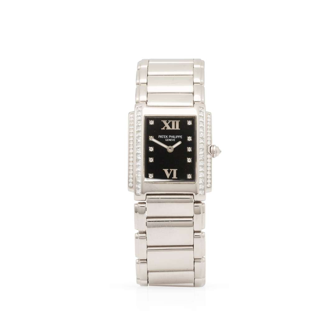 Patek Philippe. A Ladies fine 18k white gold and diamond-set quartz bracelet watch