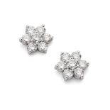 A pair of 18ct gold diamond cluster earrings