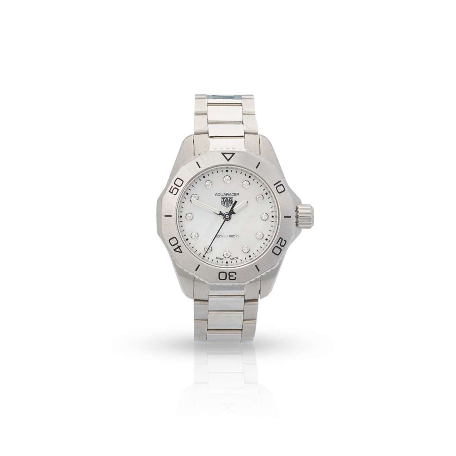 Tag Heuer: A stainless steel Ladies dive watch with diamond-set mother of pearl dial